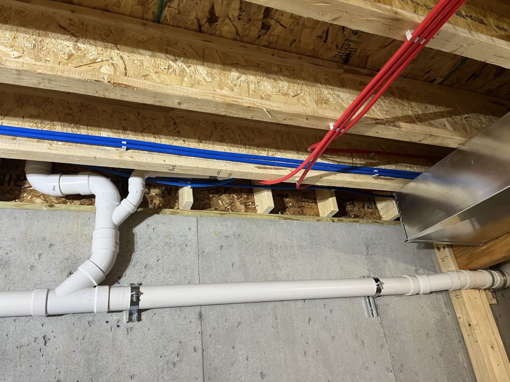 New construction plumbing installation of PEX water lines