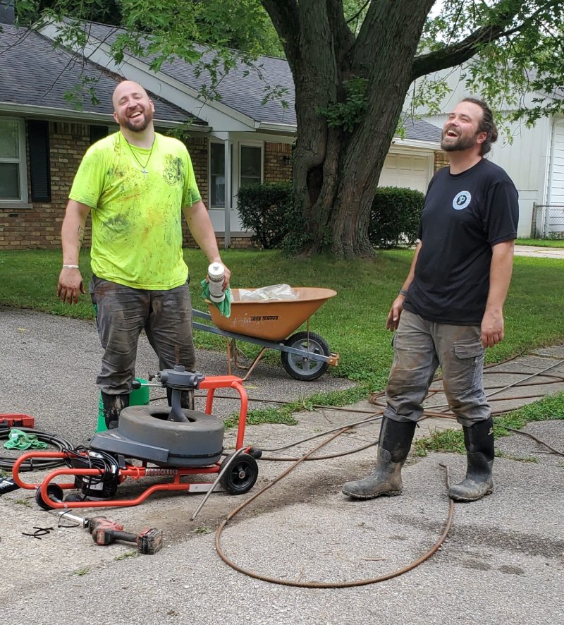 plumbers laughing