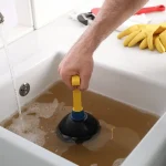 clogged drain cause a leak