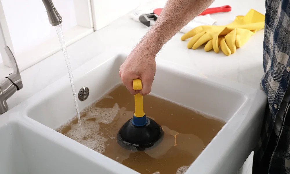 clogged drain cause a leak