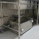 clean a grease trap in a restaurant